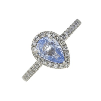 Lot 208 - A platinum pear-shape sapphire and diamond cluster ring