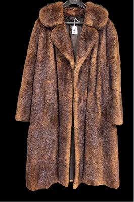 Lot 332 - A musquash fur coat