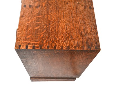 Lot 392 - A Cotswold School, Arts and Crafts oak desk,...