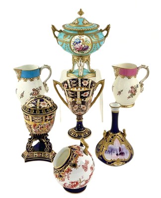 Lot 142 - A group of Royal Crown Derby cabinet pieces,...