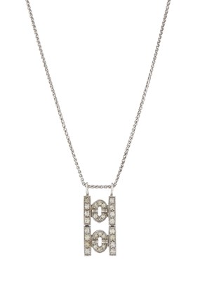 Lot 206 - A 14ct gold diamond geometric pendant, with platinum chain