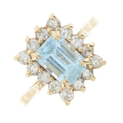 Lot 217 - A 14ct gold blue topaz and diamond cluster ring