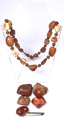 Lot 312 - A selection of amber jewellery