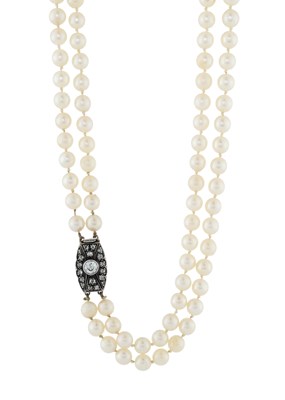 Lot 154 - An early to mid 20th century pearl two-row necklace, with old-cut diamond clasp