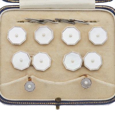 Lot 222 - An 18ct and 9ct gold mother-of-pearl dress stud set