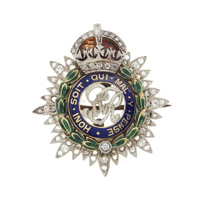 Lot 124 - A gold and platinum enamel and diamond Royal Army Service Corps regimental sweetheart brooch