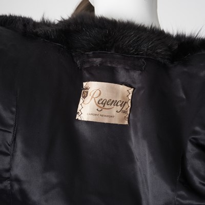 Lot 550 - Regency Furs, a black musquash fur coat with fox fur collar