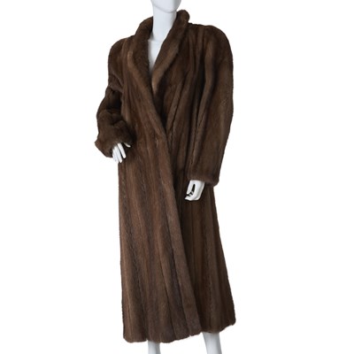 Lot 558 - A demi-buff mink coat.