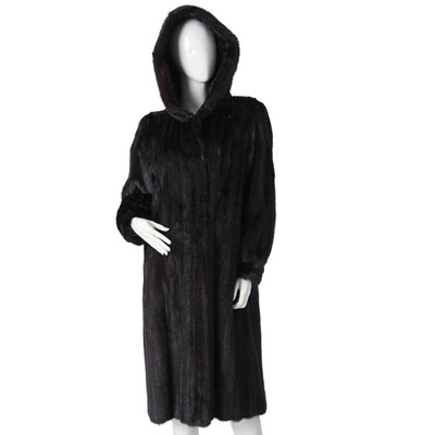 Lot 560 - A hooded dark ranch mink coat.