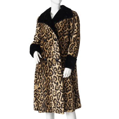 Lot 547 - Bergdorf Goodman, a faux fur coat with seal fur trim.