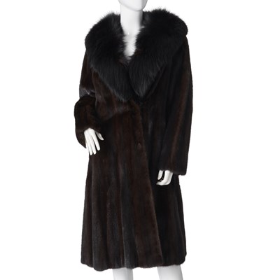 Lot 568 - A dark ranch mink coat with fox fur collar.