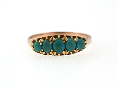 Lot 10 - A yellow metal graduated turquoise cabochon...