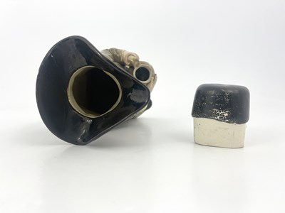 Lot 1046 - A Staffordshire Toby jug and beaker lid, Ralph...
