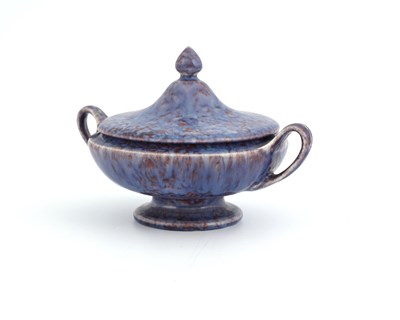 Lot 593 - Ruskin Pottery, a Souffle glazed twin handled...