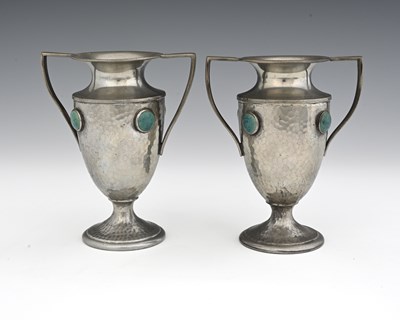 Lot 164 - A pair of Arts and Crafts pewter and Ruskin...