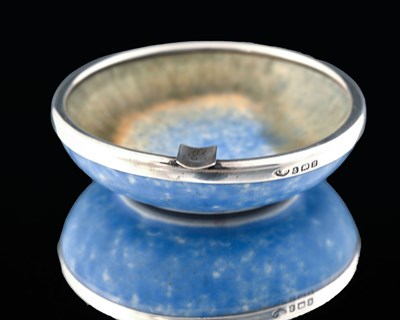 Lot 133 - A E Jones for Ruskin Pottery, a silver mounted...