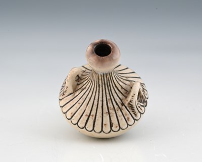 Lot 52 - Edwin and Walter Martin, a miniature stoneware...