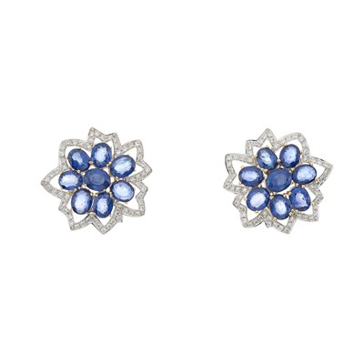 Lot 194 - A pair of 18ct gold sapphire and diamond cluster earrings