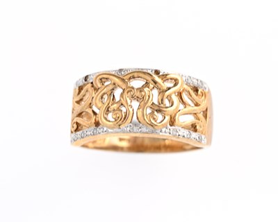 Lot 7 - A 9ct gold diamond openwork ring