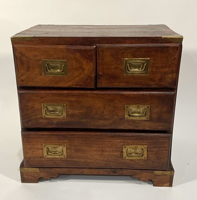 Lot 368 - A colonial campaign style chest, brass bound...