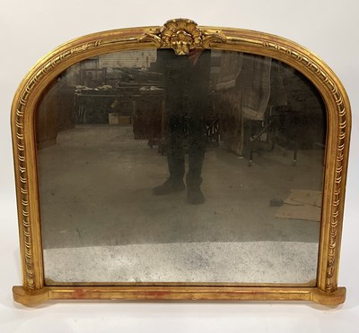 Lot 419 - A gilt arched overmantel mirror, 19th century,...