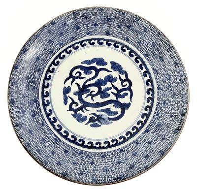 Lot 145 - A Japanese blue and white charger, 19th...