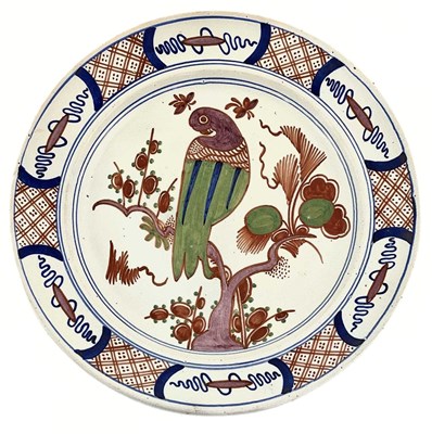 Lot 162 - A Dutch Delft polychrome dish, depicting a...