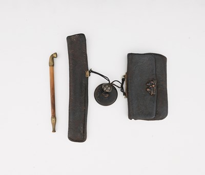 Lot 35 - A Japanese leather and bamboo sagemono...