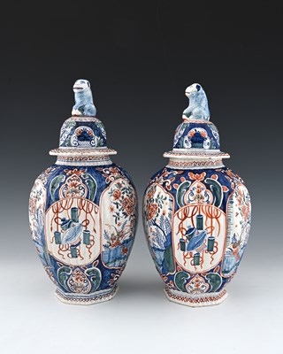 Lot 534 - A pair of faience octagonal vases, 19th...