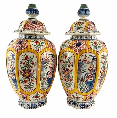 Lot 170 - A pair of covered octagonal vases in the...