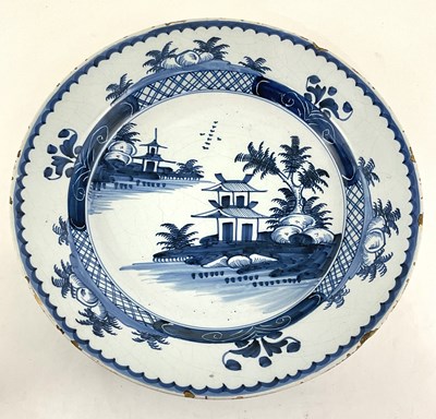 Lot 144 - An English Delftware charger, Lambeth, London,...