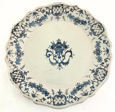 Lot 164 - A French faience plate, Rouen, 19th century,...