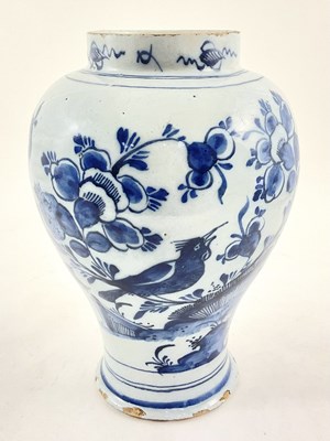 Lot 163 - A Dutch Delft baluster vase, decorated in...