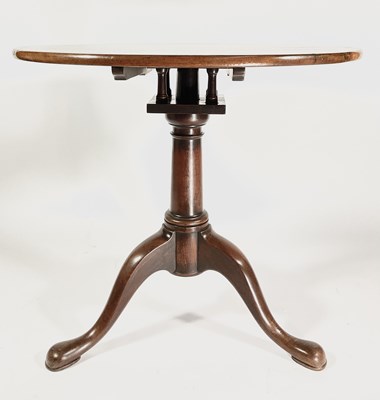 Lot 385 - A George III mahogany tripod tilt top table,...