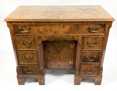 Lot 397 - A Georgian design burr walnut kneehole desk,...