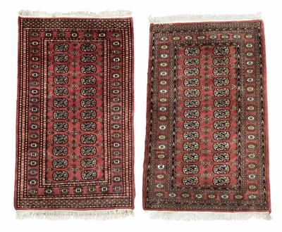 Lot 340 - Two Bokhara-type wool rugs, brown geometric...