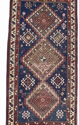 Lot 341 - A Turkish Yalameh style Navy and red wool rug...