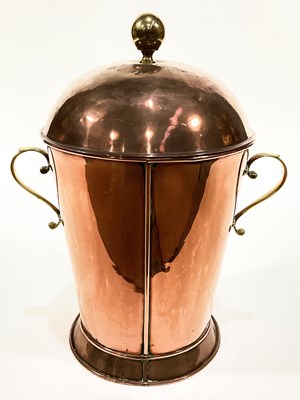 Lot 417 - A copper and brass dome-lidded, twin-handled...