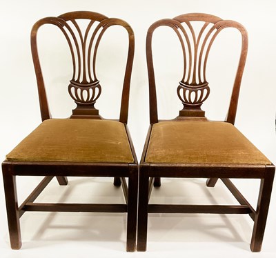 Lot 383 - A matched set of four Georgian mahogany dining...