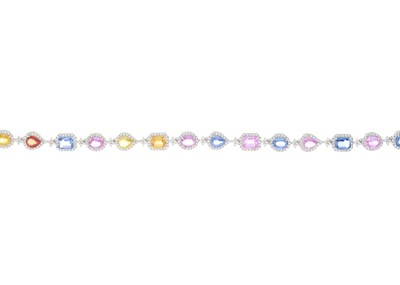 Lot 95 - An 18ct gold harlequin sapphire and diamond line bracelet