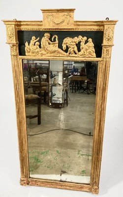 Lot 420 - A Regency gilt pier mirror, c.1820, swag and...