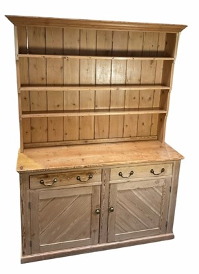 Lot 393 - A stripped pine dresser in the English country...