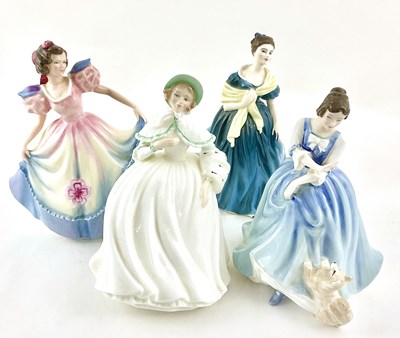 Lot 107 - A collection of Royal Doulton figurines, a...