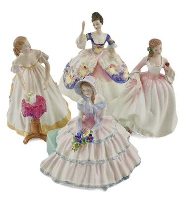 Lot 105 - A collection of Royal Doulton figurines,...