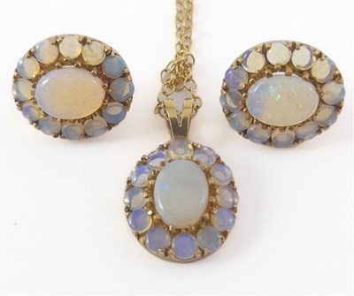 Lot 288 - A 9ct gold opal cluster necklace and a pair of earrings