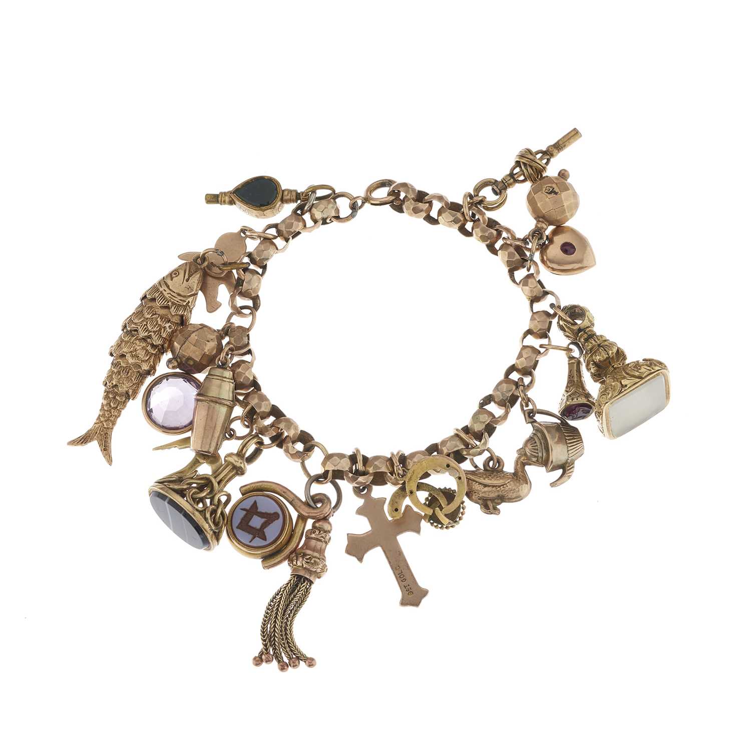 Lot 15 - An early to mid 20th century gold charm...