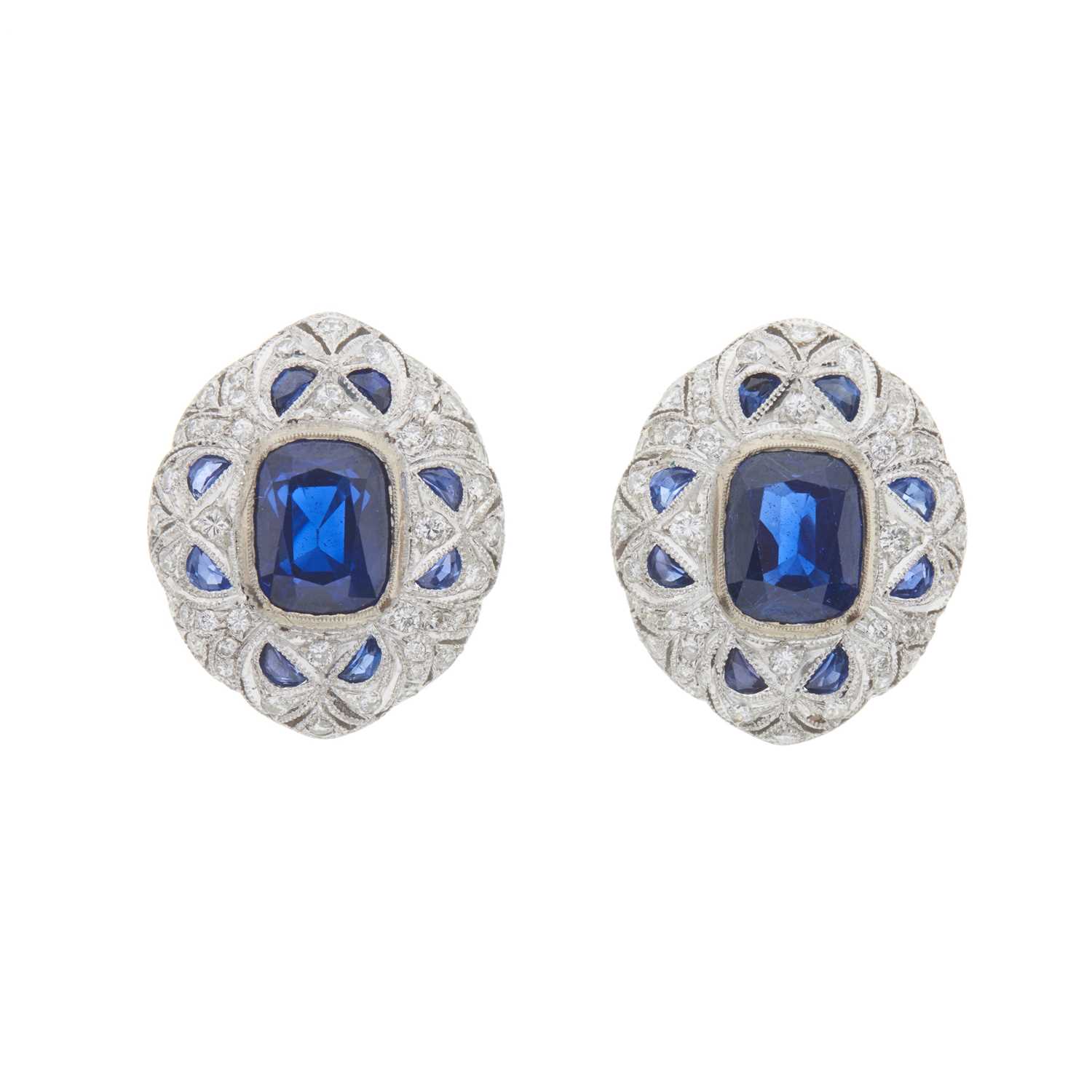 Lot 91 - A pair of 18ct gold sapphire and diamond cluster clip earrings