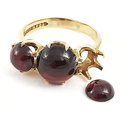 Lot 263 - A 9ct gold garnet three-stone ring, AF