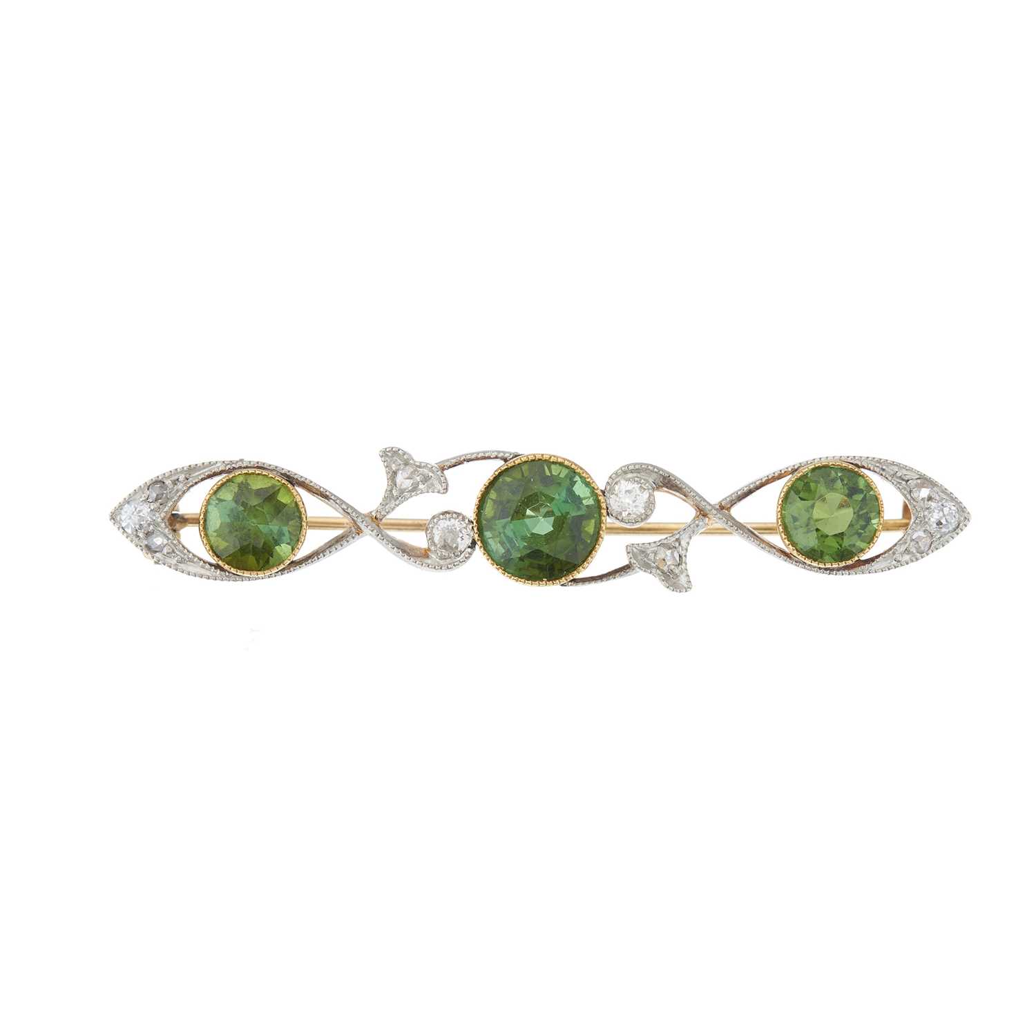 Lot 18 - An Edwardian gold and silver, green tourmaline...