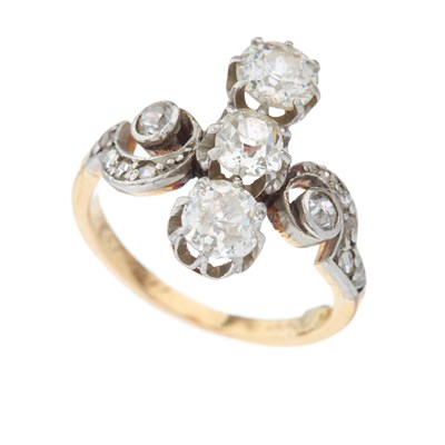 Lot 27 - An Art Nouveau 18ct gold diamond three-stone...